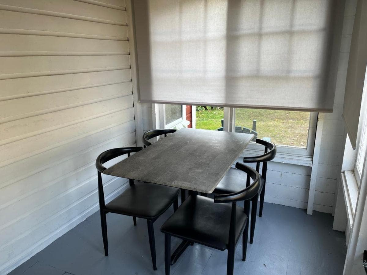 Screened porch dining table set for four